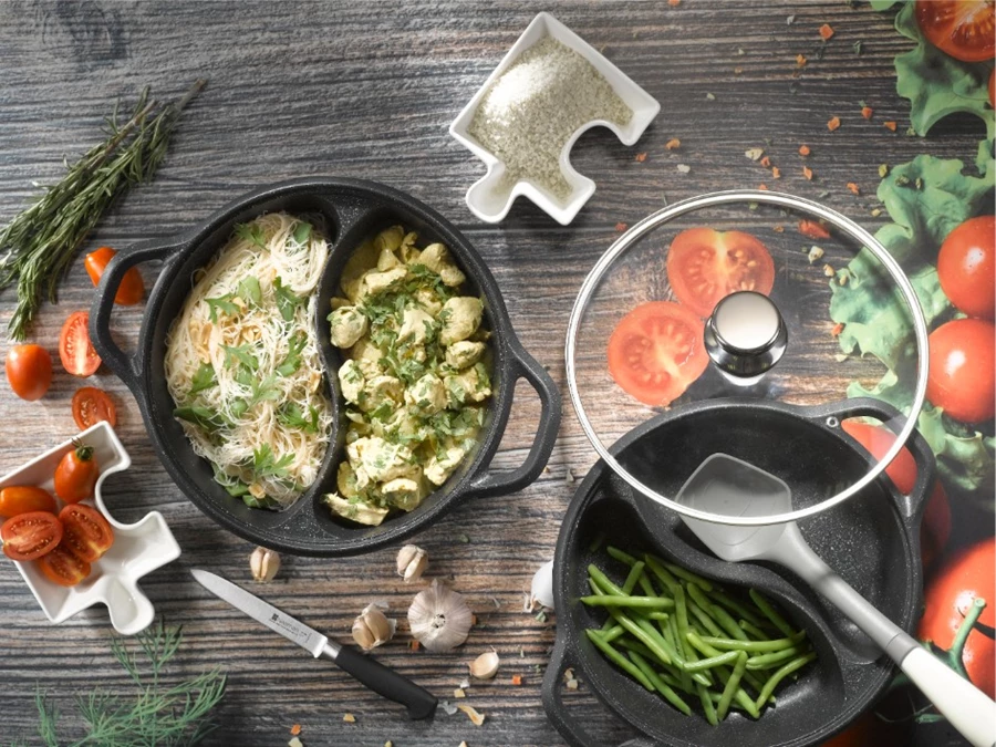 סיר מחולק של נעמן לבישול בו זמנית של 2 תבשילים שונים ובנוסף מאד יצירתי גם להגשה.