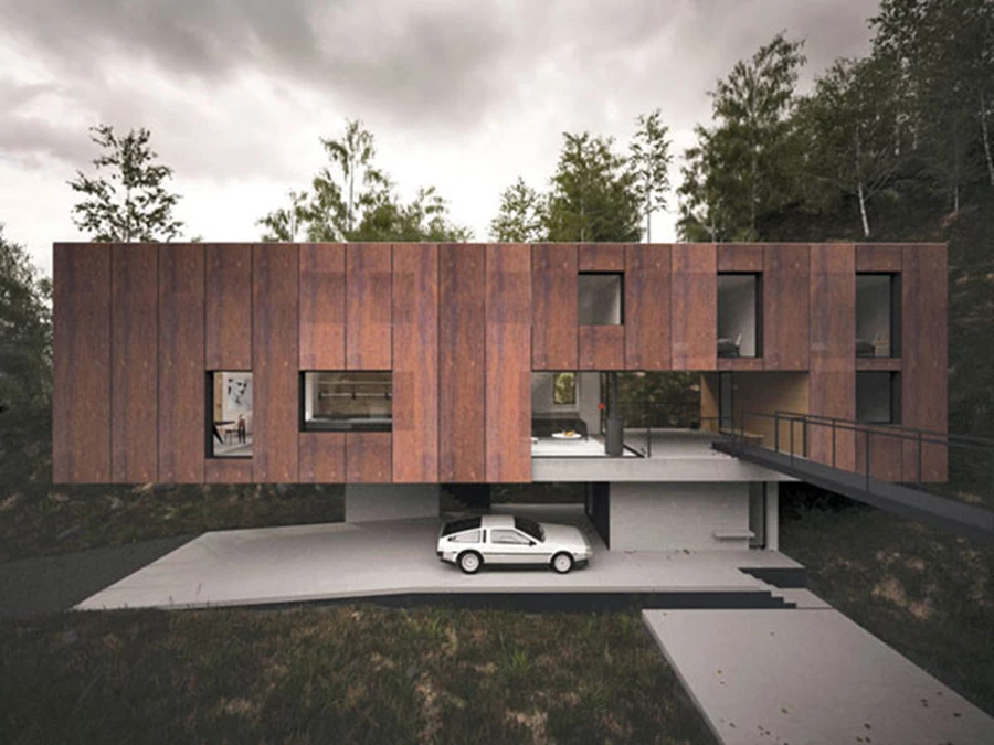 מבט אל המבנה המחופה כולו ברצועות קורטן דמוי חלודה המתכתב בגונו עם נוף הסביבה. הפתחים במבנה מאפשרים לאור טבעי לחדור פנימה.